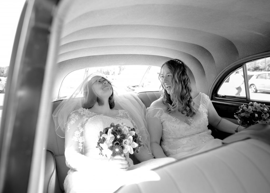 two brides arrive in car together