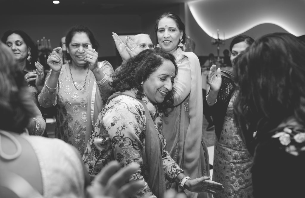 black and white picture of mother of the bride dancing