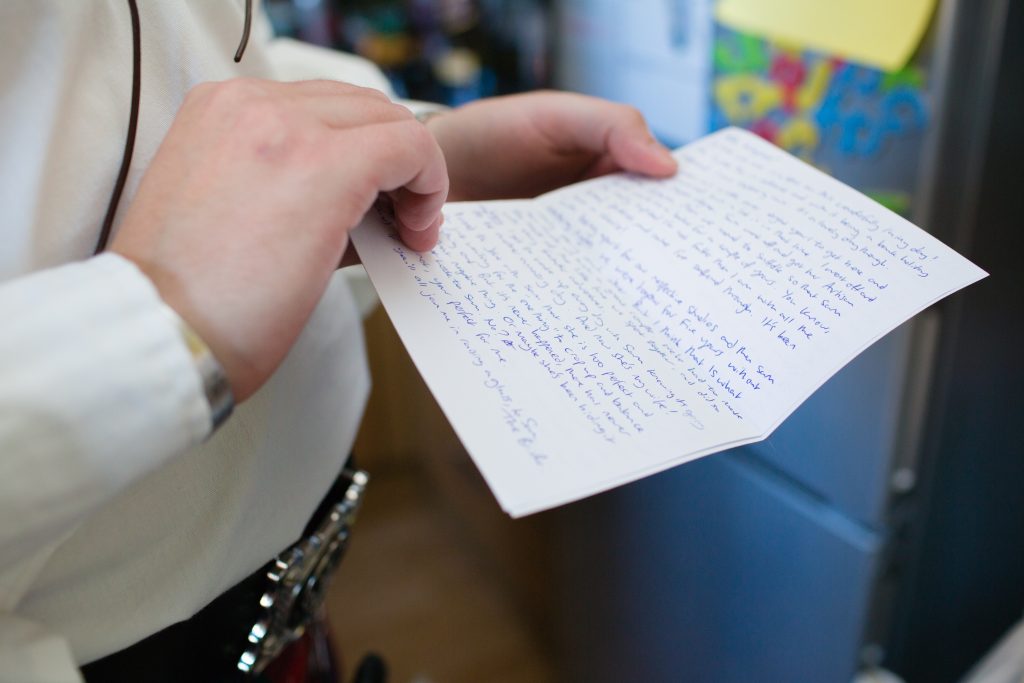 close up photo of wedding speech of groom