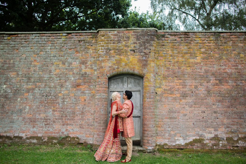 bride and groom in walled area at sweeney hotel