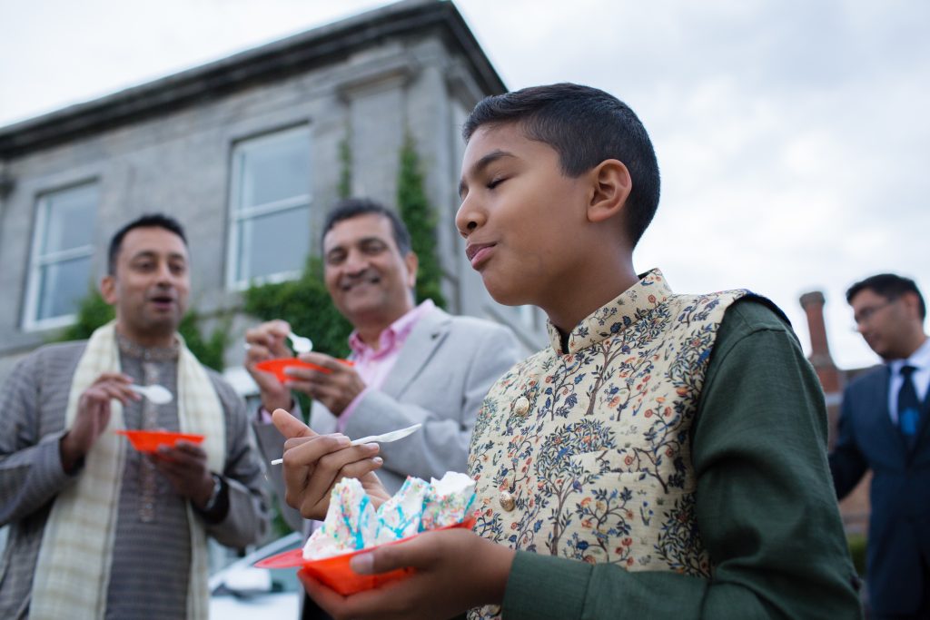 young wedding guest with icecream