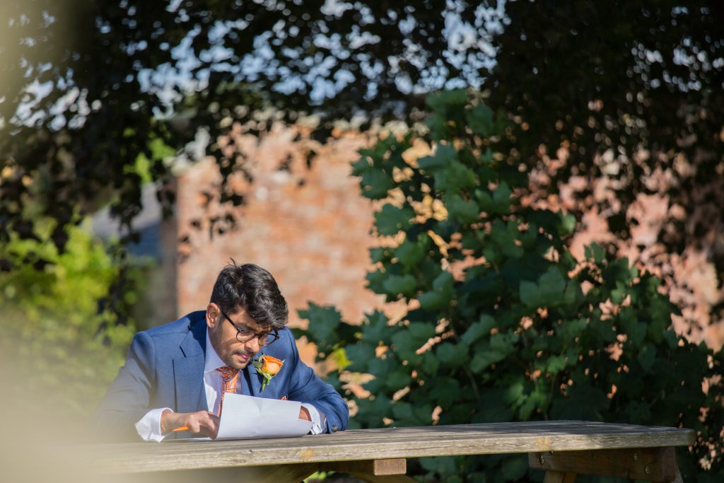 groom making changes to speech