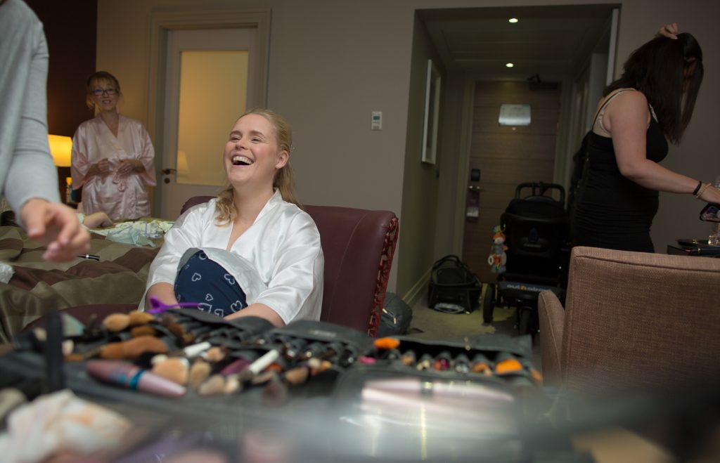 bride laughing before wedding