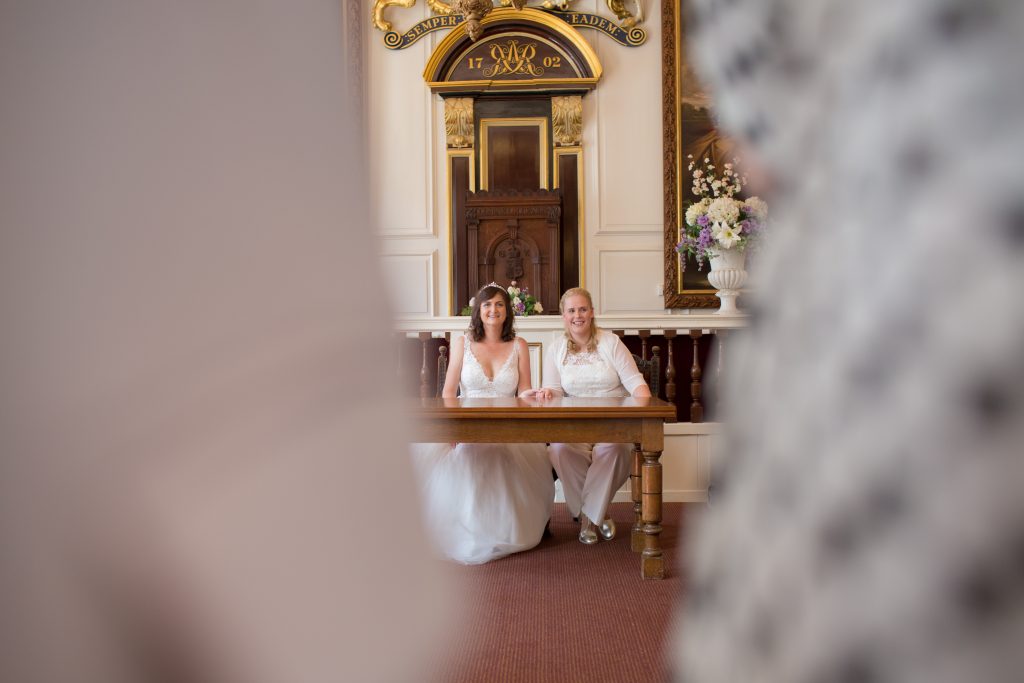 photo of two brides inside windsor guildhall