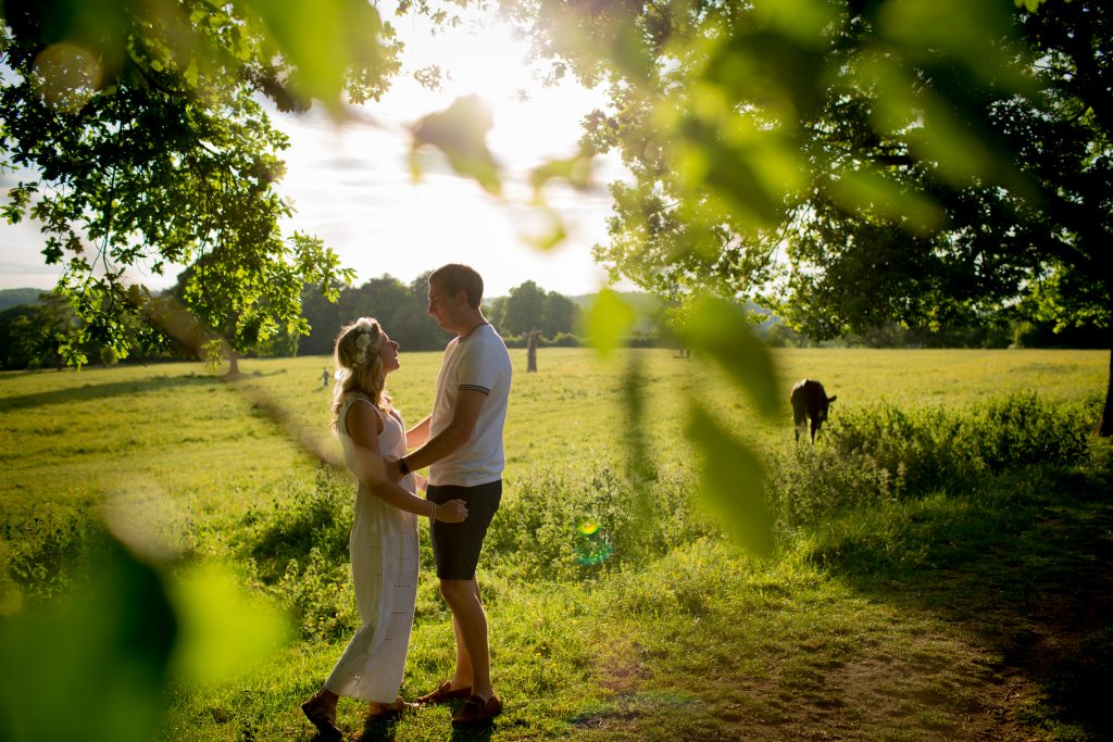 photo of bride and groom to be taken through trees