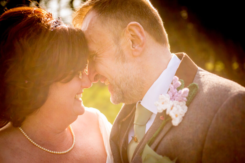 bride and groom stood in nice sun